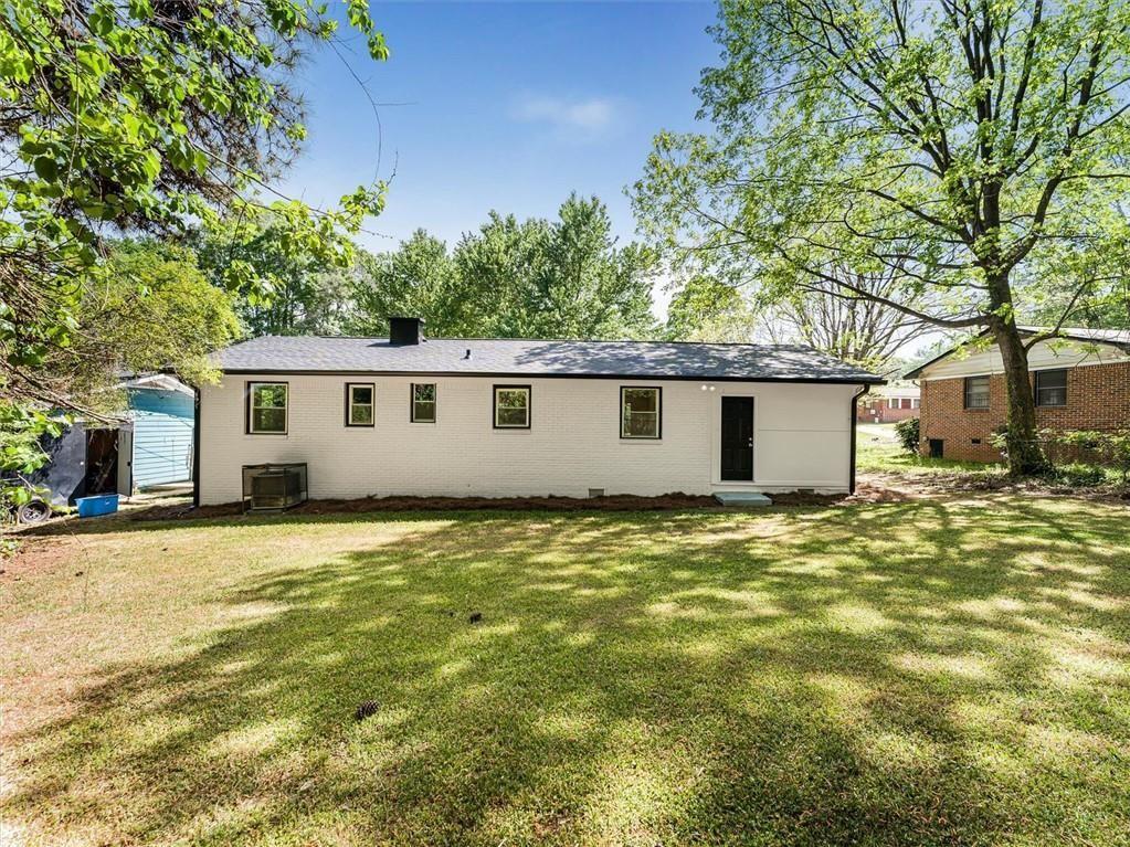 454 Oak Drive Southeast Atlanta, GA 30354 - Photo 27 of 29 a view of a house with a backyard