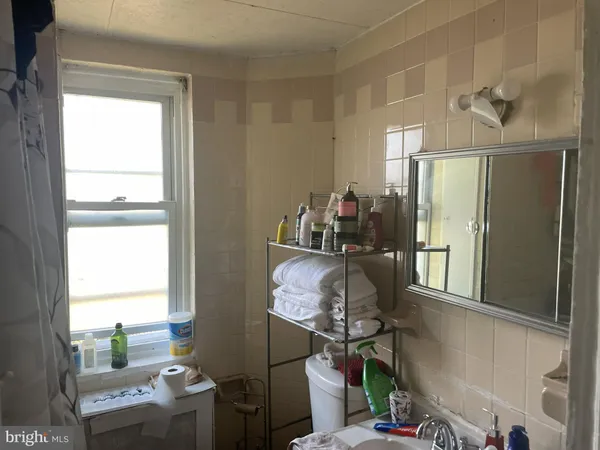 a room with furniture and a window