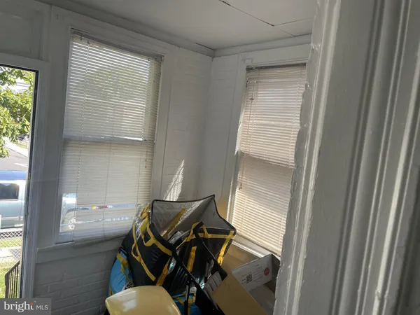 a view of a livingroom with furniture and windows