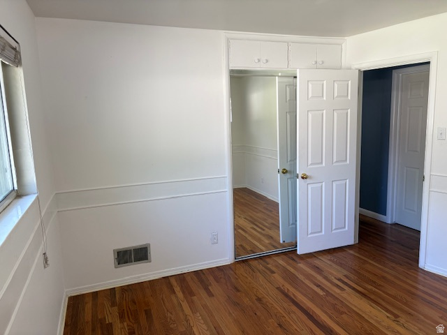 2313 150 East Bountiful, UT 84010 - Photo 17 of 39 Hardwood flooring complements white walls with decorative trim