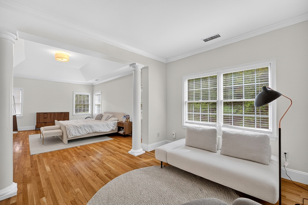 4 Summit Way, Unit 1 Hopkinton, MA 01748 - Photo 17 of 27 a living room with furniture and a large window