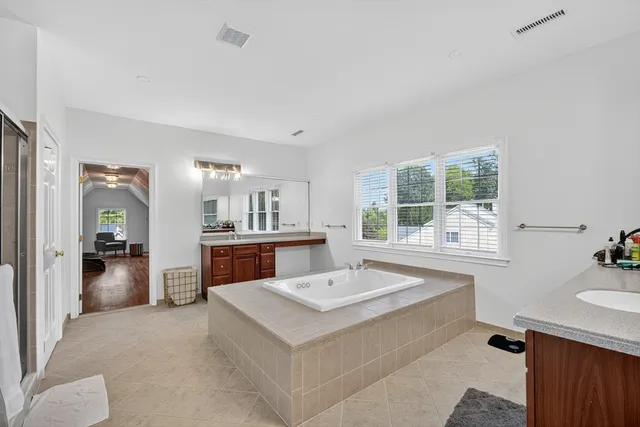 a view of living room with granite countertop furniture and fireplace