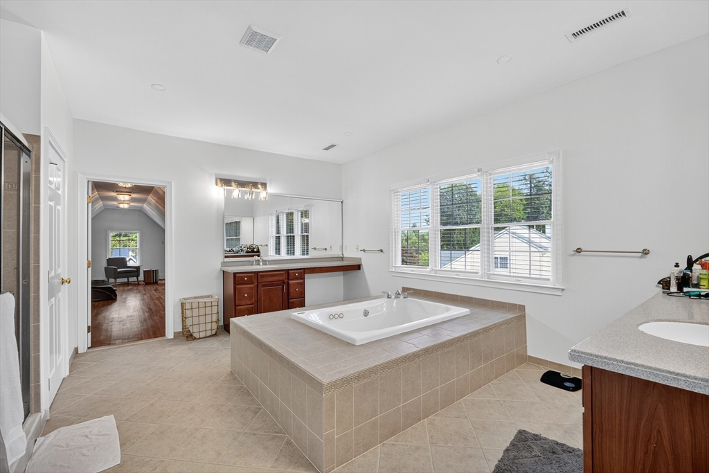 4 Summit Way, Unit 1 Hopkinton, MA 01748 - Photo 18 of 27 a view of living room with granite countertop furniture and fireplace