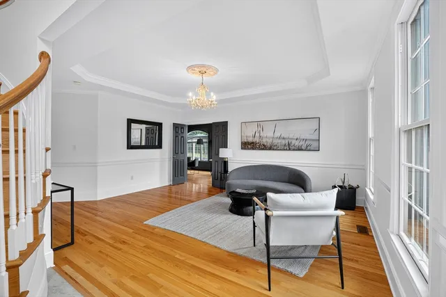 a living room with furniture and a table