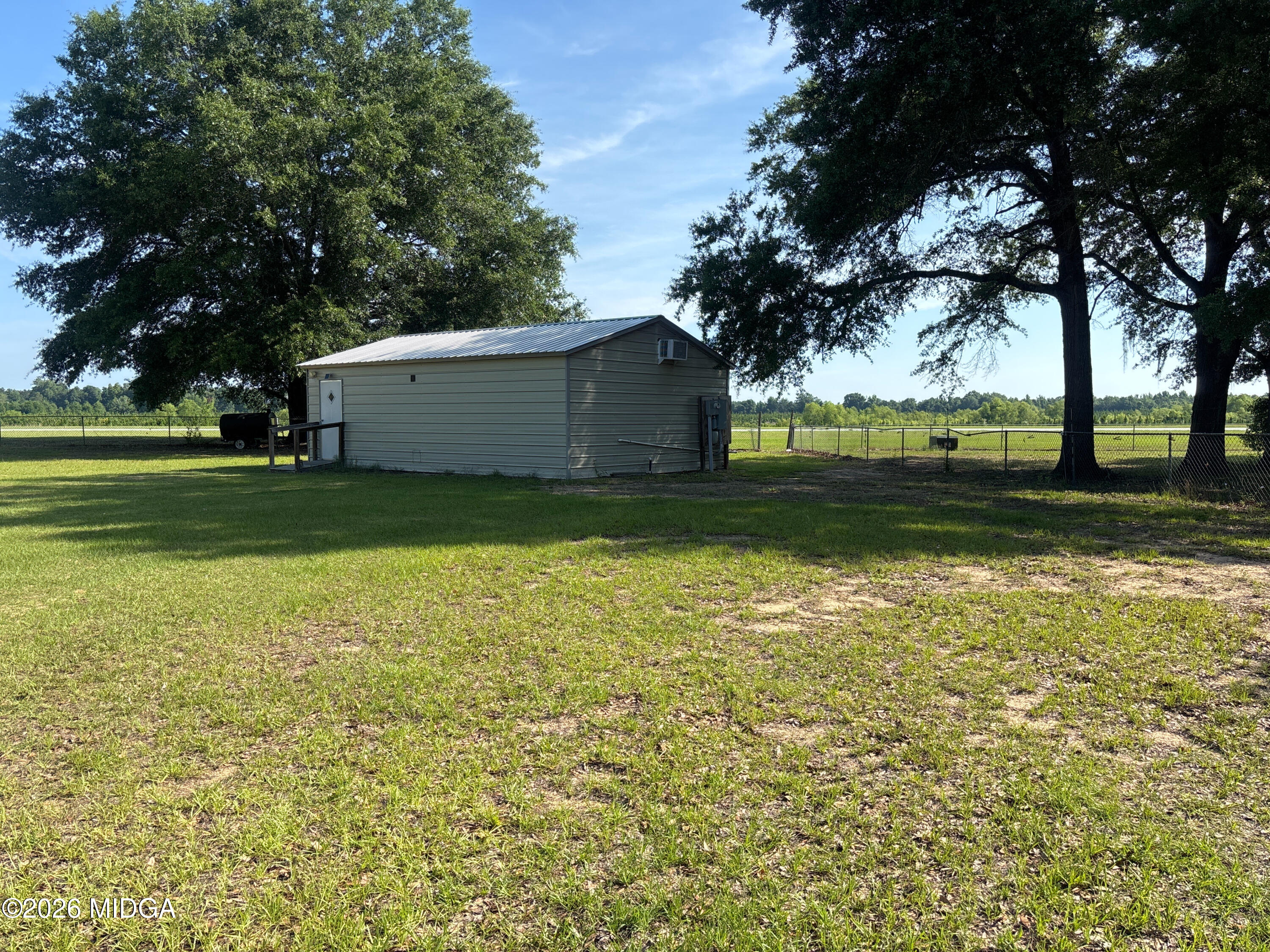 0 Lot Road Hawkinsville, GA 31036 - Photo 1 of 8 a view of a backyard