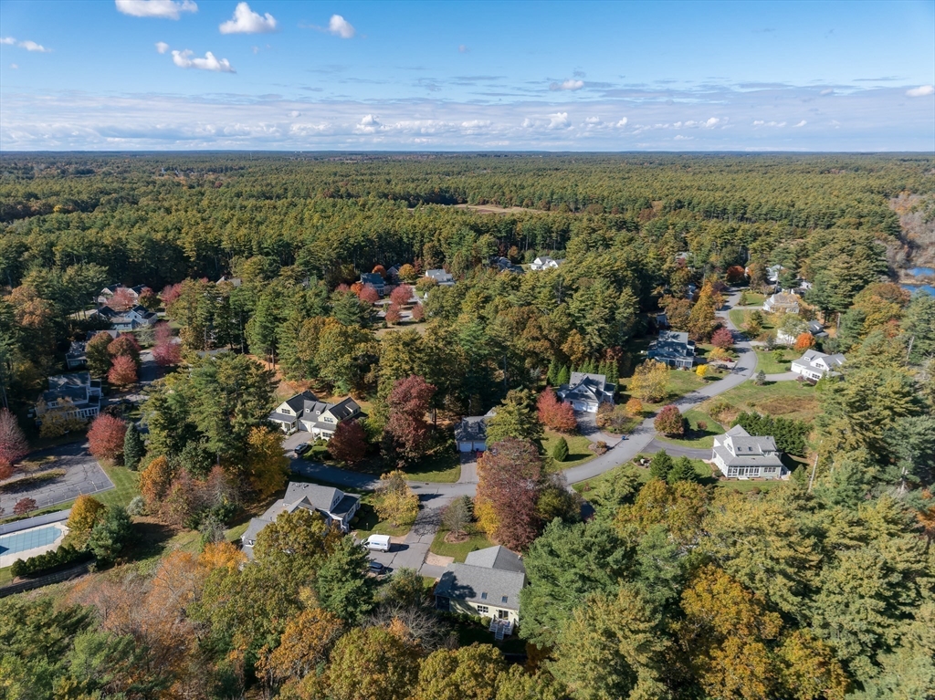 57 Hathaway Pond Circle, Unit 57 Rochester, MA 02770 - Photo 28 of 40 a view of a city with a mountain