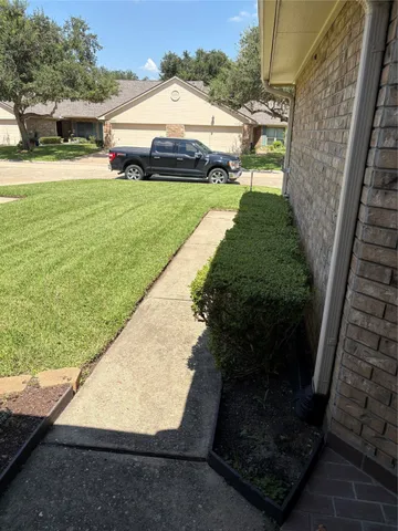 a view of a back yard of the house