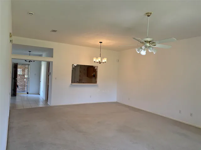a view of a livingroom with a flat screen tv