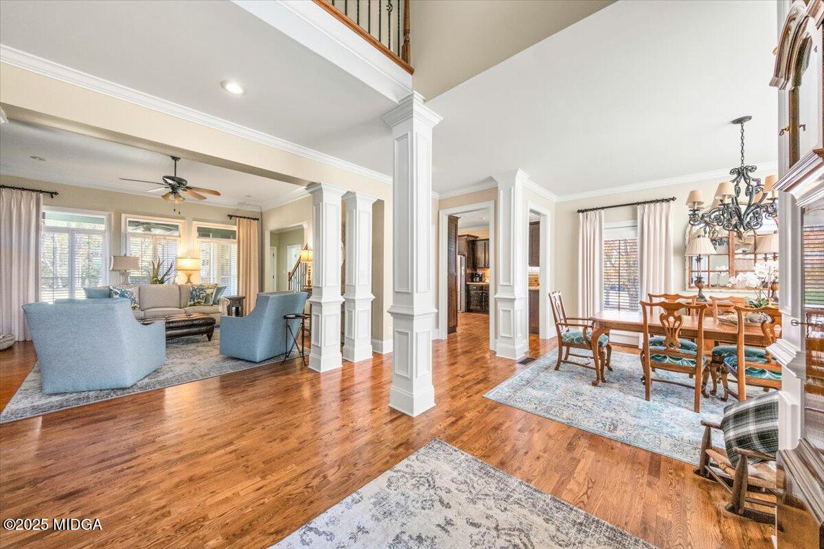 1060 East Magnolia Loop Madison, GA 30650 - Photo 18 of 41 a living room with furniture and wooden floor