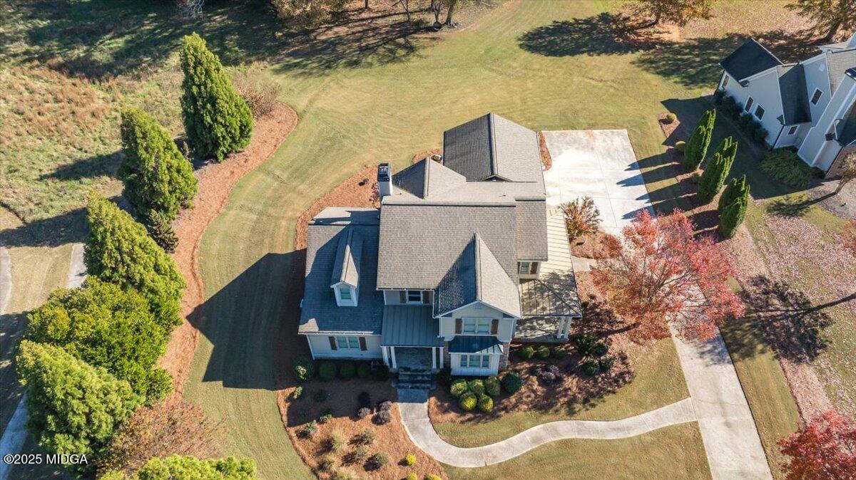 1060 East Magnolia Loop Madison, GA 30650 - Photo 2 of 41 an aerial view of a house with a yard