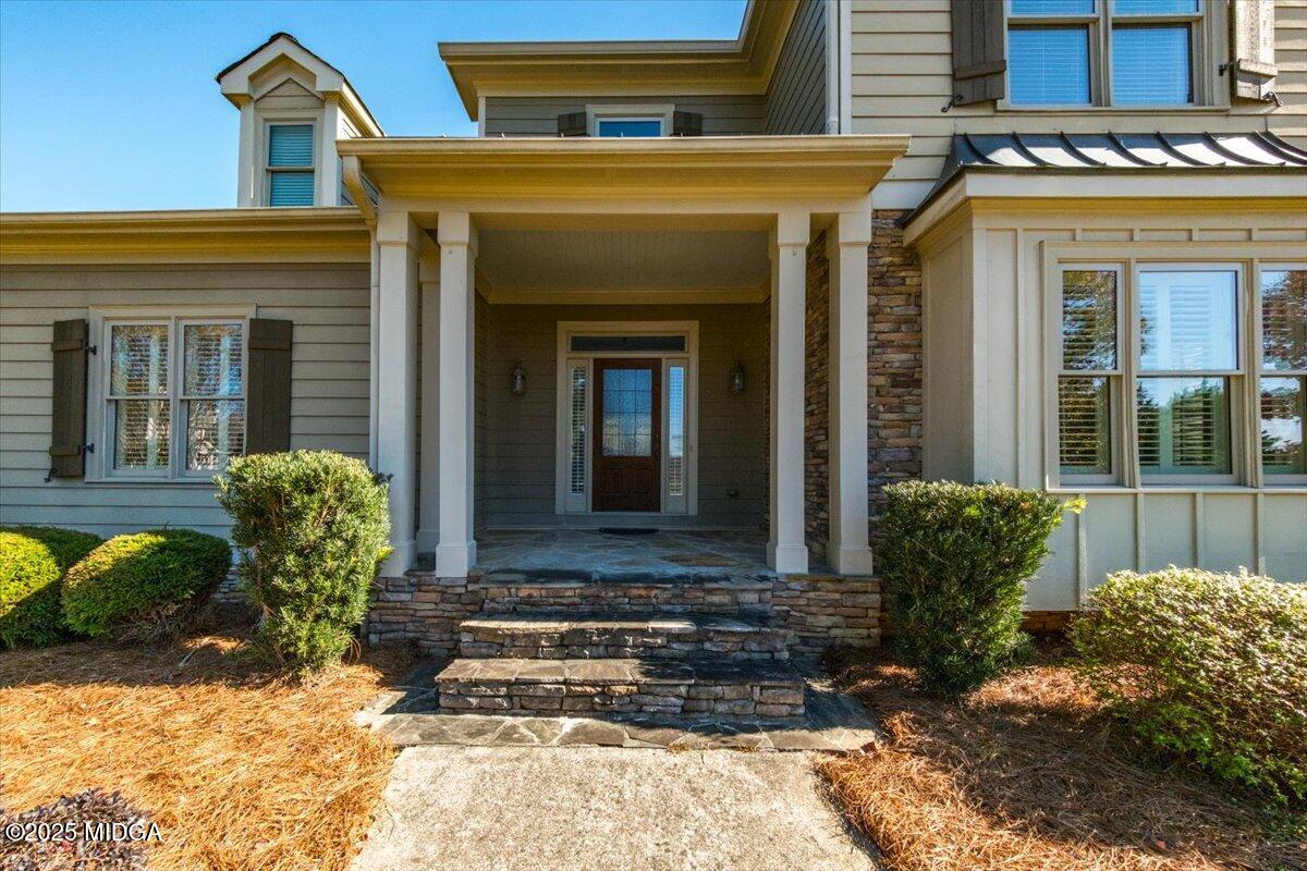 1060 East Magnolia Loop Madison, GA 30650 - Photo 3 of 41 a front view of a house