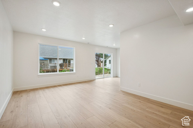 1615 North Angel Street, Unit E Layton, UT 84041 - Photo 19 of 42 Empty room featuring light wood-style flooring and recessed lighting