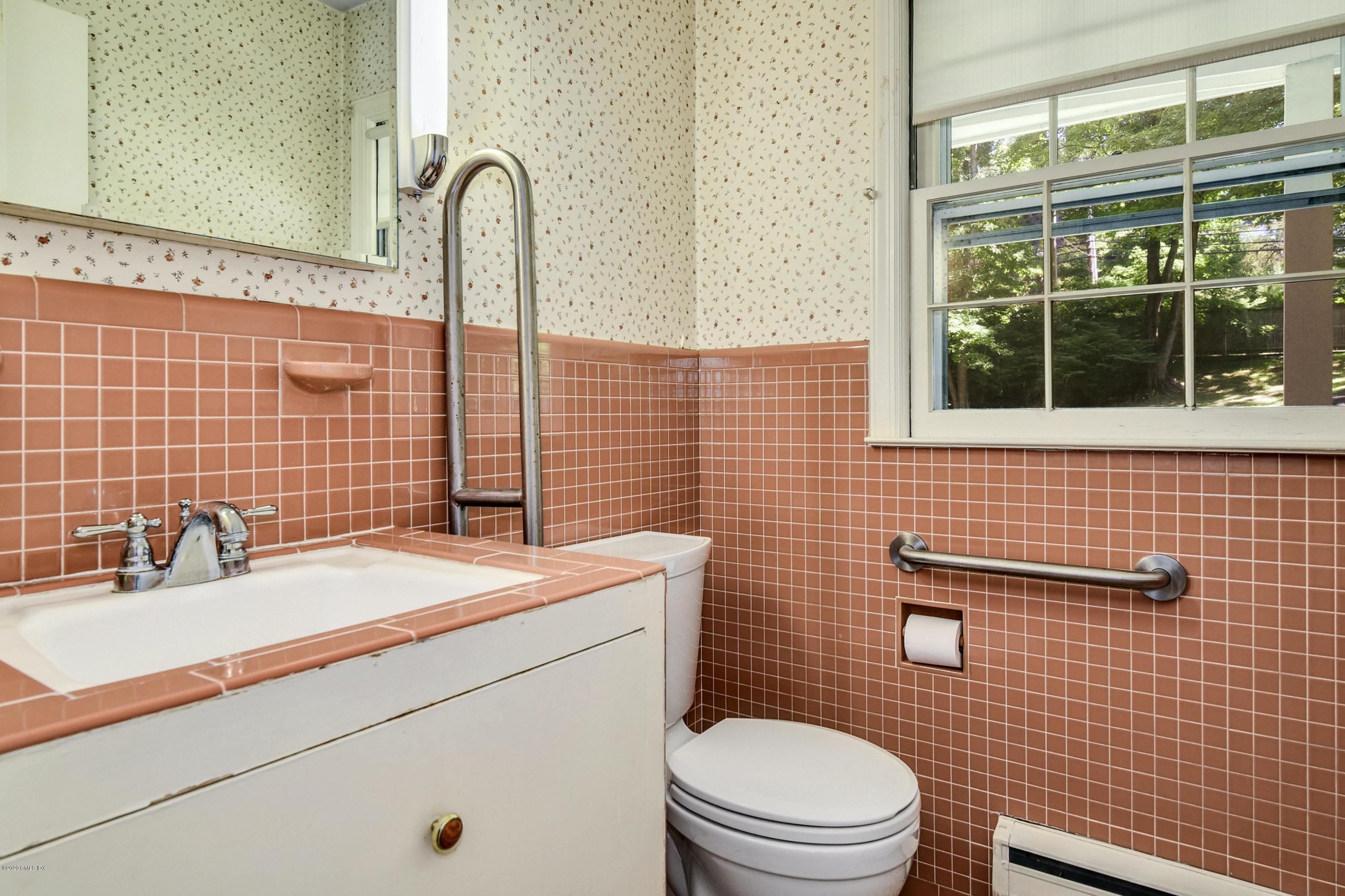 230 Stanwich Road Greenwich, CT 06830 - Photo 24 of 28 a bathroom with a sink a toilet and shower