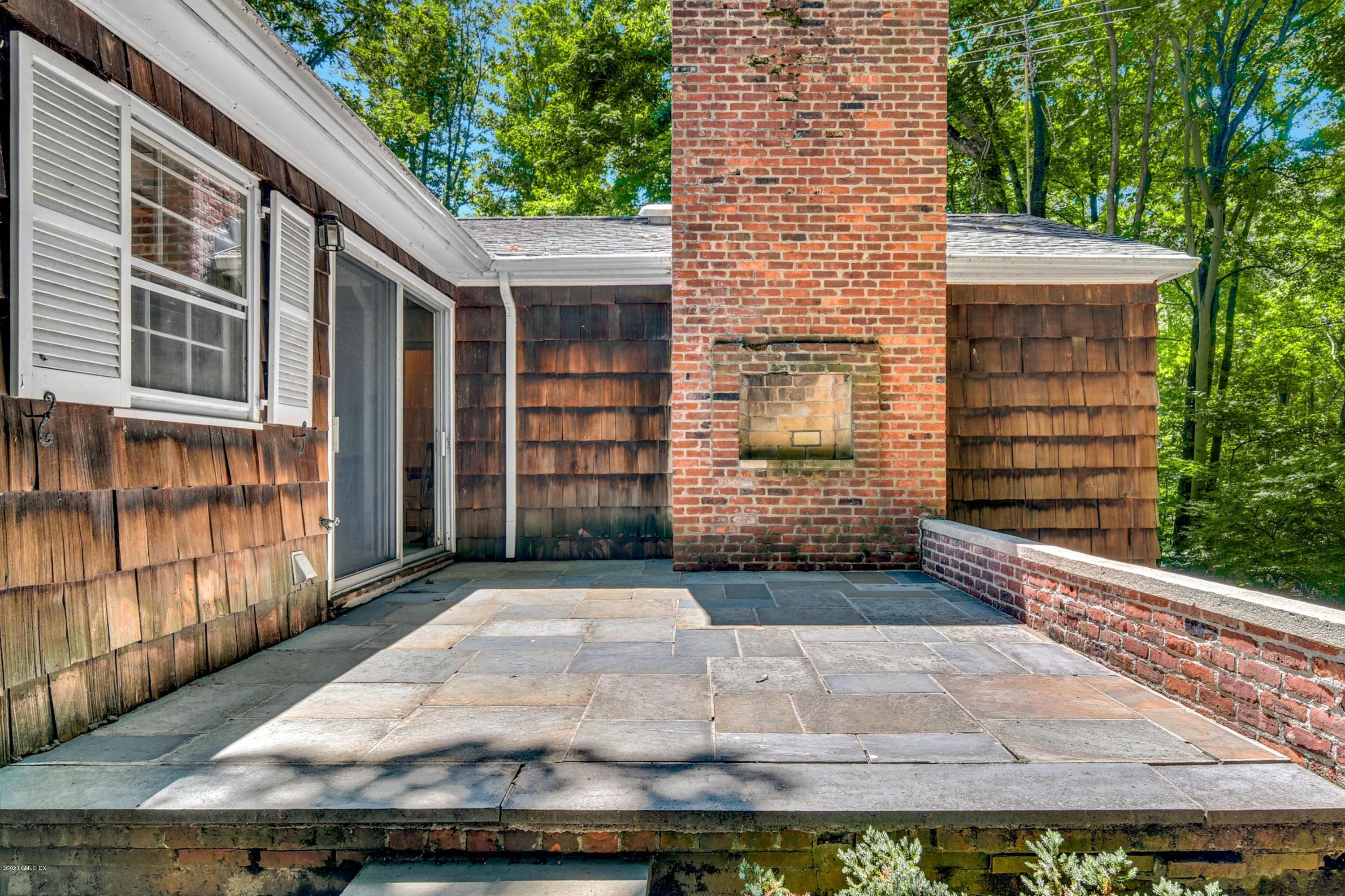 230 Stanwich Road Greenwich, CT 06830 - Photo 26 of 28 a view of house with backyard porch