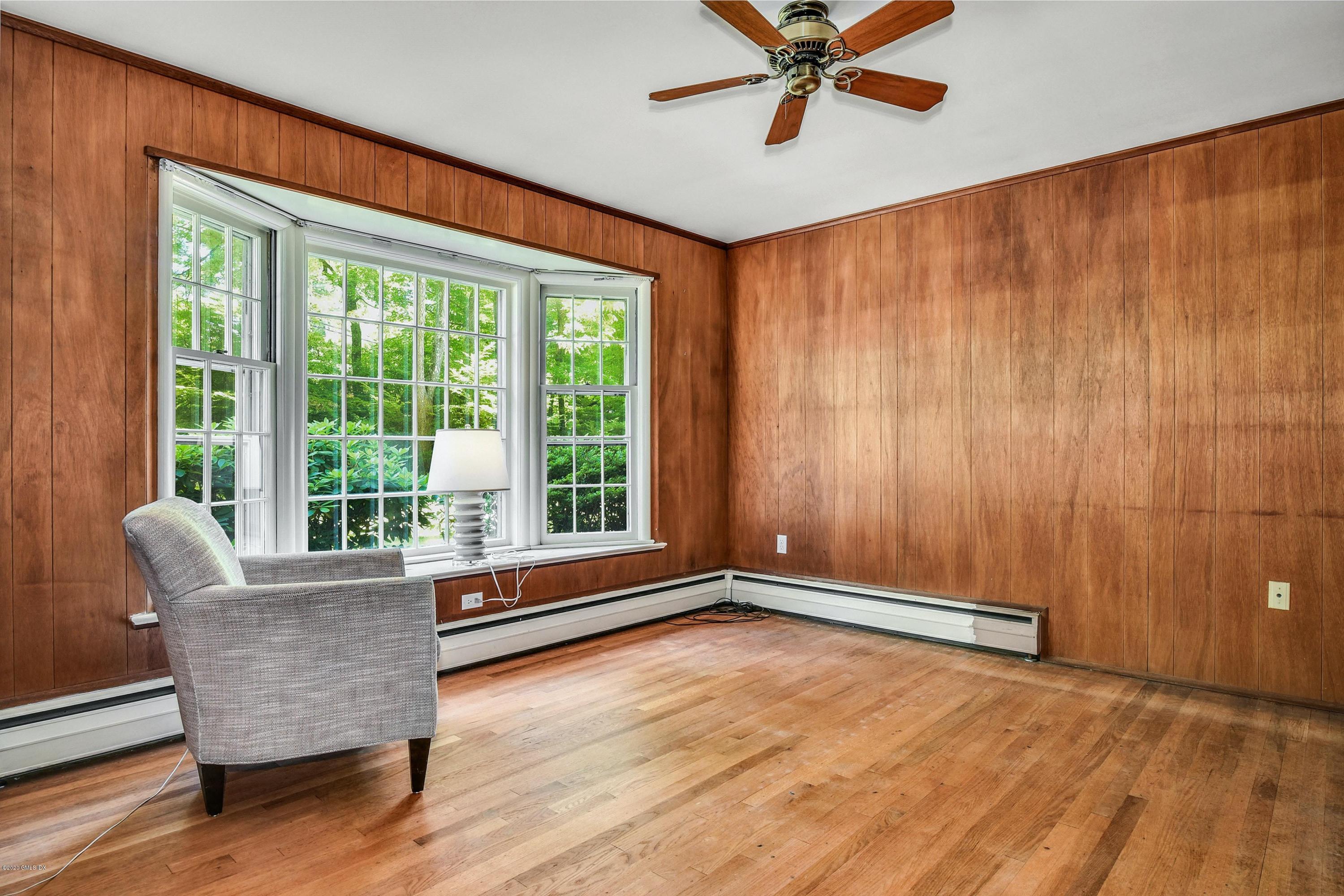 230 Stanwich Road Greenwich, CT 06830 - Photo 7 of 28 a view of room with window and wooden floor