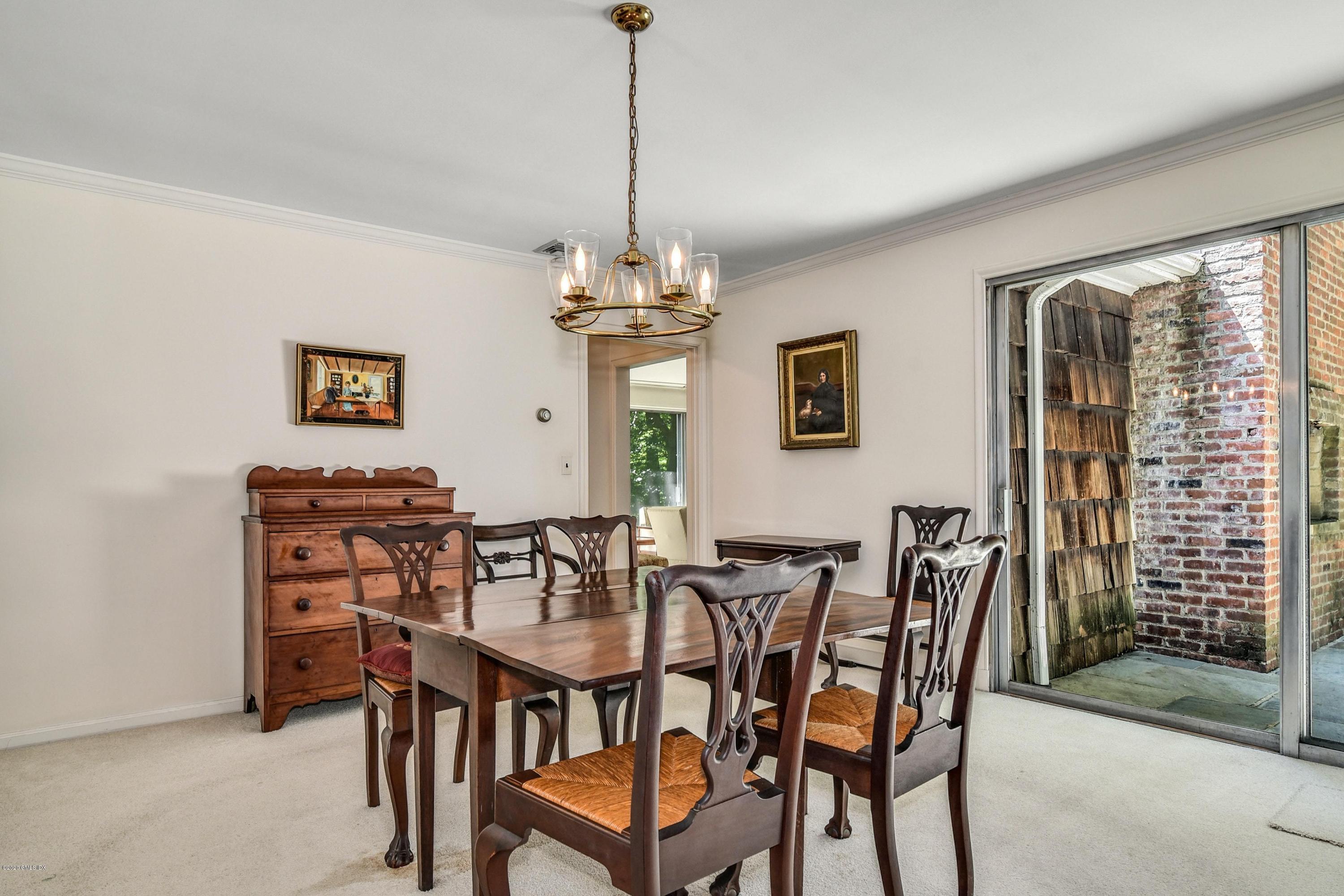 230 Stanwich Road Greenwich, CT 06830 - Photo 10 of 28 a view of a dining room with furniture window and outside view