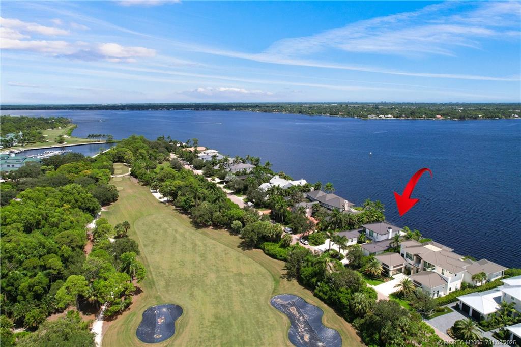 2834 Southwest Rivers End Way Palm City, FL 34990 - Photo 55 of 62 a view of a lake with a beach