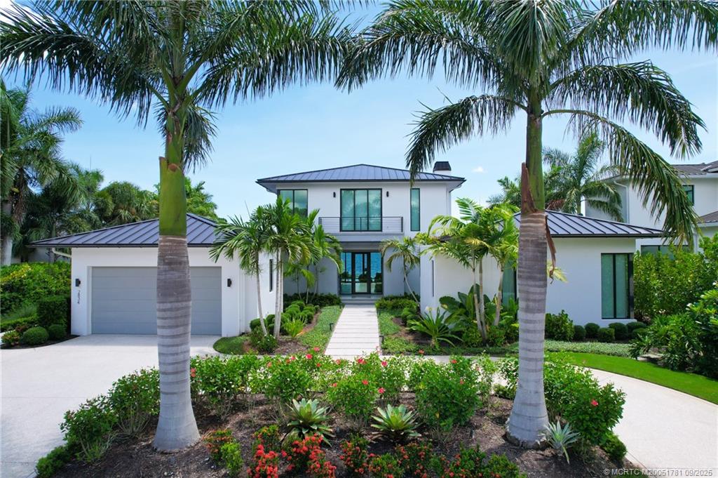 2834 Southwest Rivers End Way Palm City, FL 34990 - Photo 8 of 62 a view of a yard with a palm plants