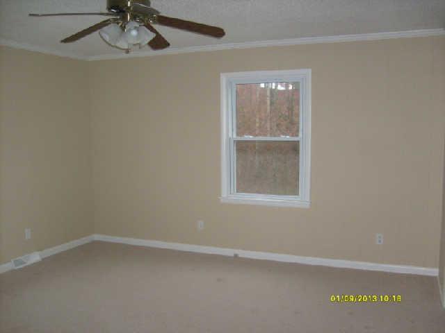 226 Busby Road Loretto, TN 38469 - Photo 6 of 16 an empty room with a window