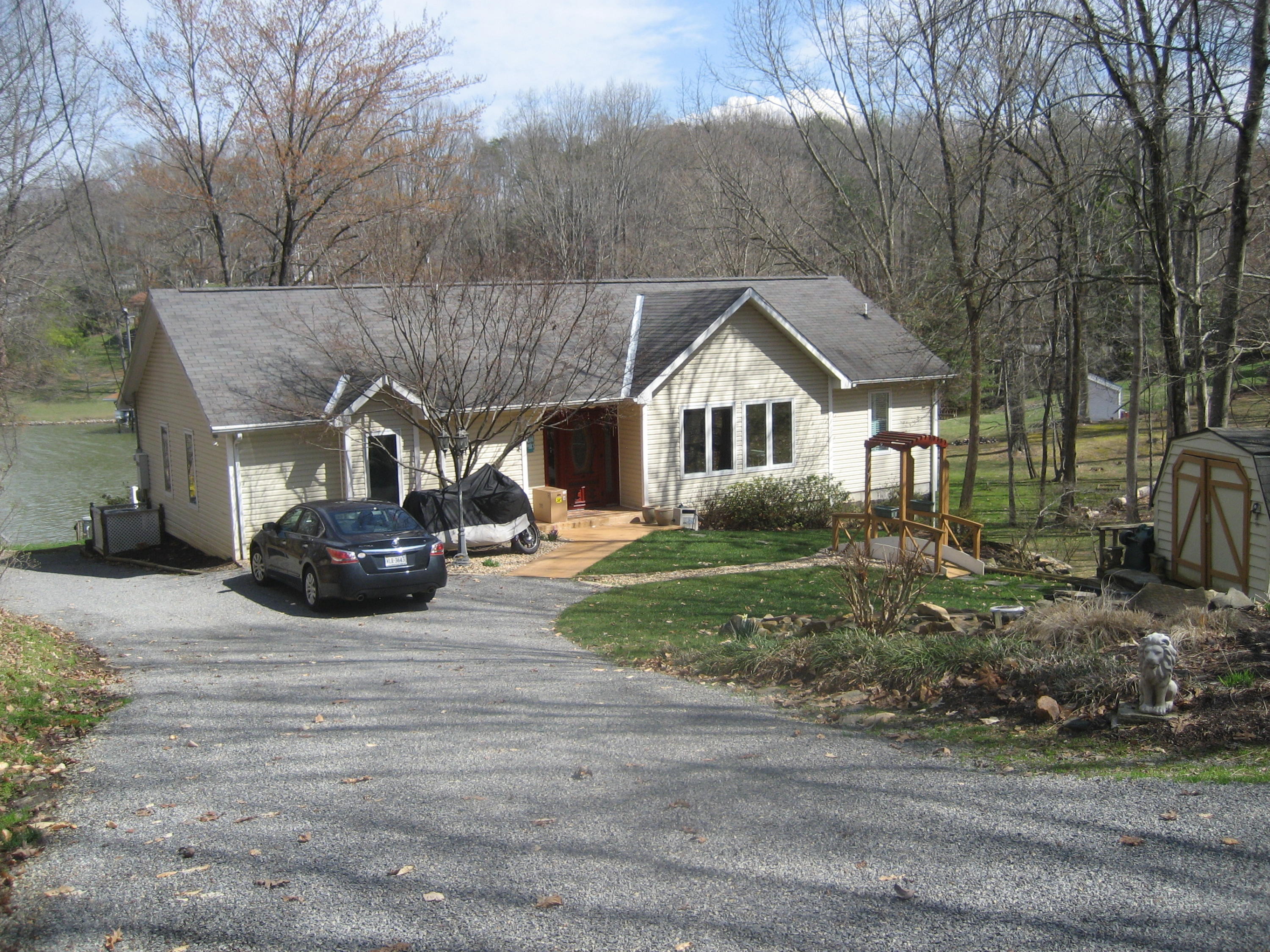575 Highland Lake Road Union Hall, VA 24176 - Photo 2 of 18 a view of house with yard and entertaining space
