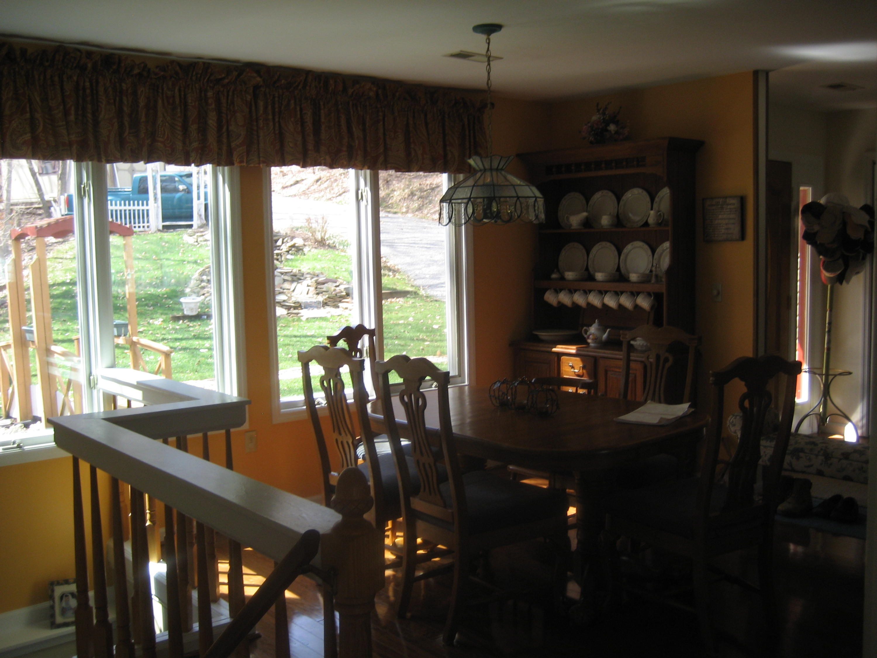 575 Highland Lake Road Union Hall, VA 24176 - Photo 14 of 18 a view of a dining room with furniture window and outside view