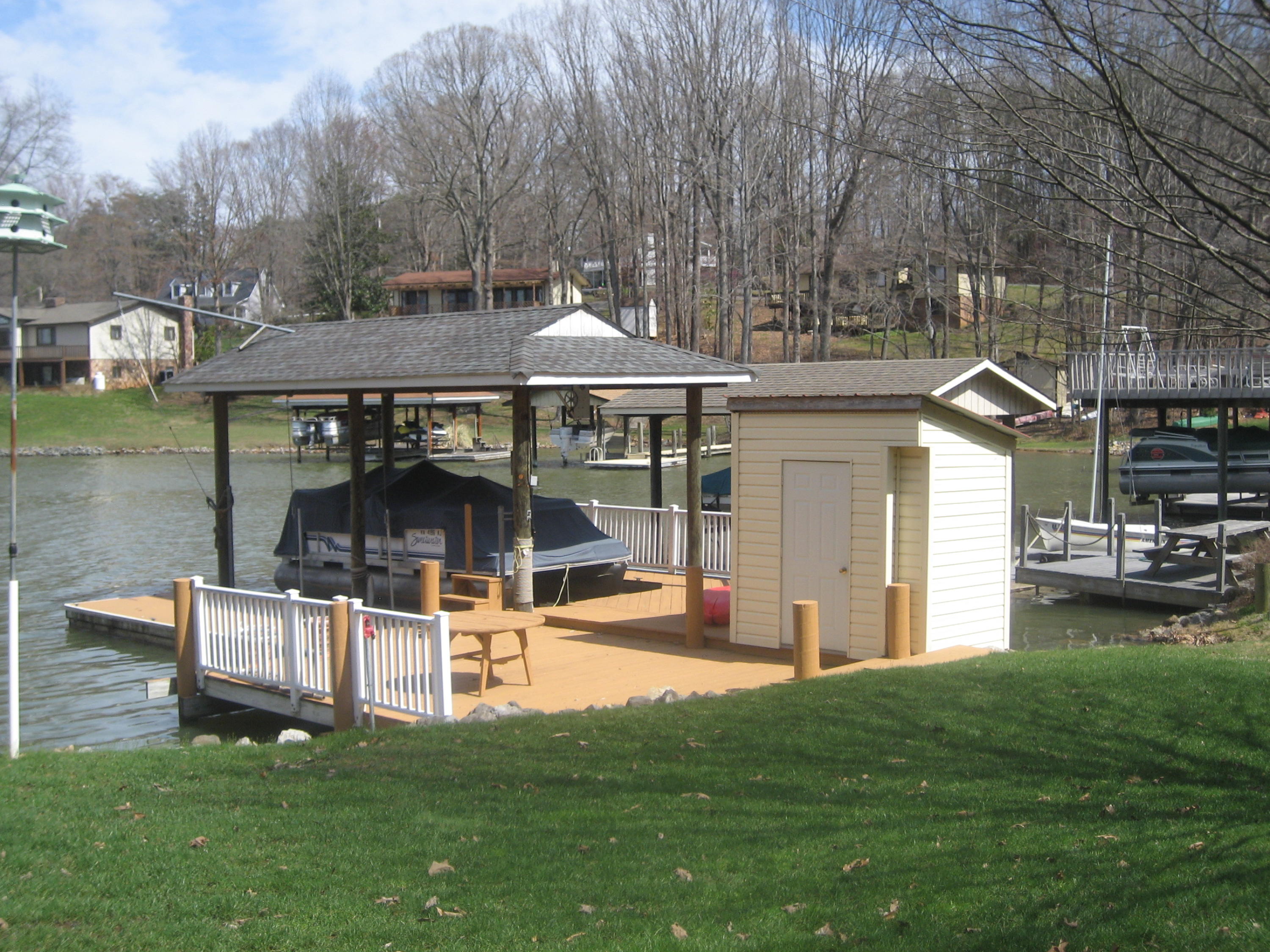 575 Highland Lake Road Union Hall, VA 24176 - Photo 10 of 18 a view of a house with backyard and sitting area