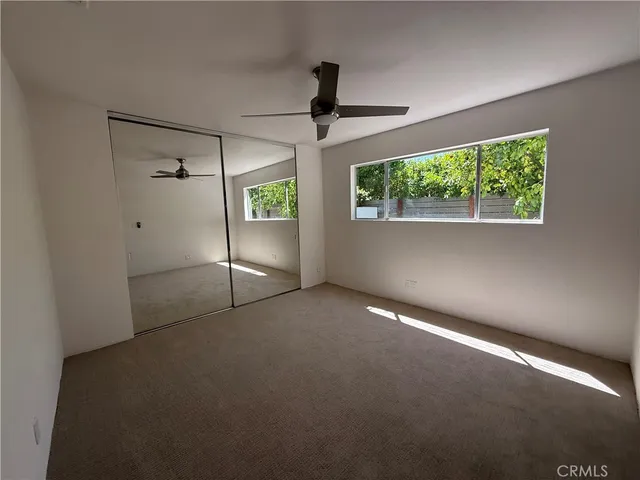 a bathroom with a sink a vanity and a mirror