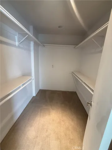 a bathroom with a double vanity sink toilet and shower