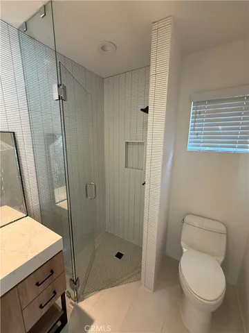 a bathroom with a sink a vanity and mirror