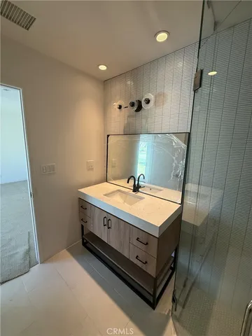 an empty room with an entrance and door