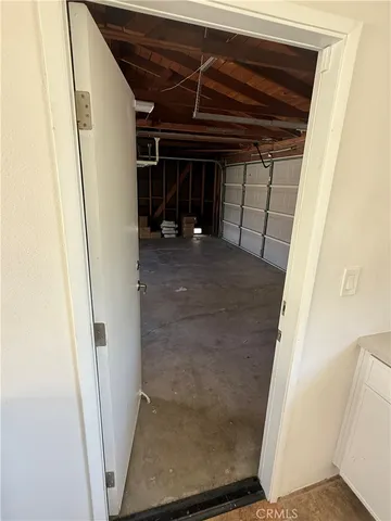a view of a room with wooden walls