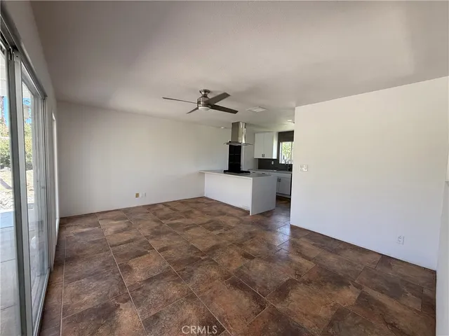 a view of a kitchen with a sink