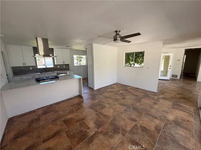 a view of a kitchen with a sink