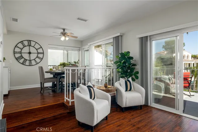 a kitchen with stainless steel appliances granite countertop a sink a stove and cabinets