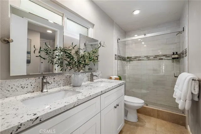 a view of a table and chairs under an umbrella