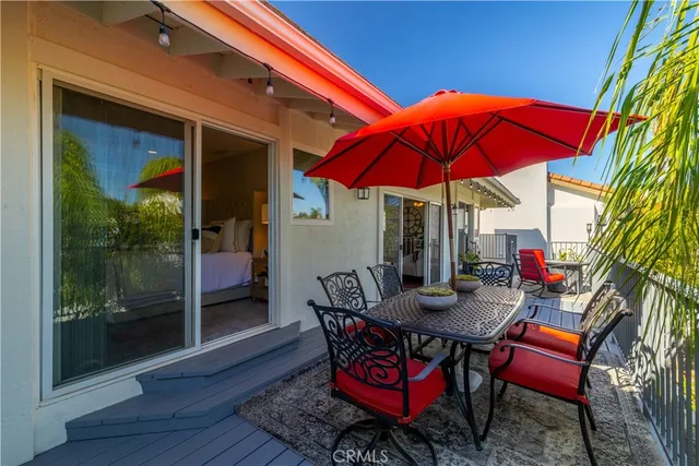 an aerial view of residential house and sandy dunes