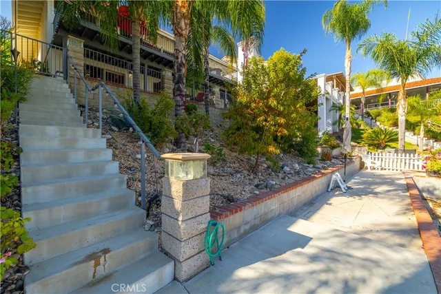 an aerial view of houses with outdoor space