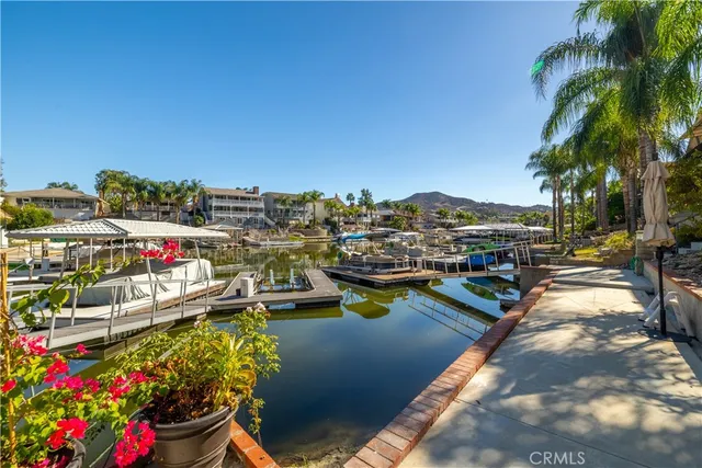 an aerial view of house with yard swimming pool and outdoor seating