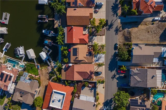 an aerial view of lake and residential houses