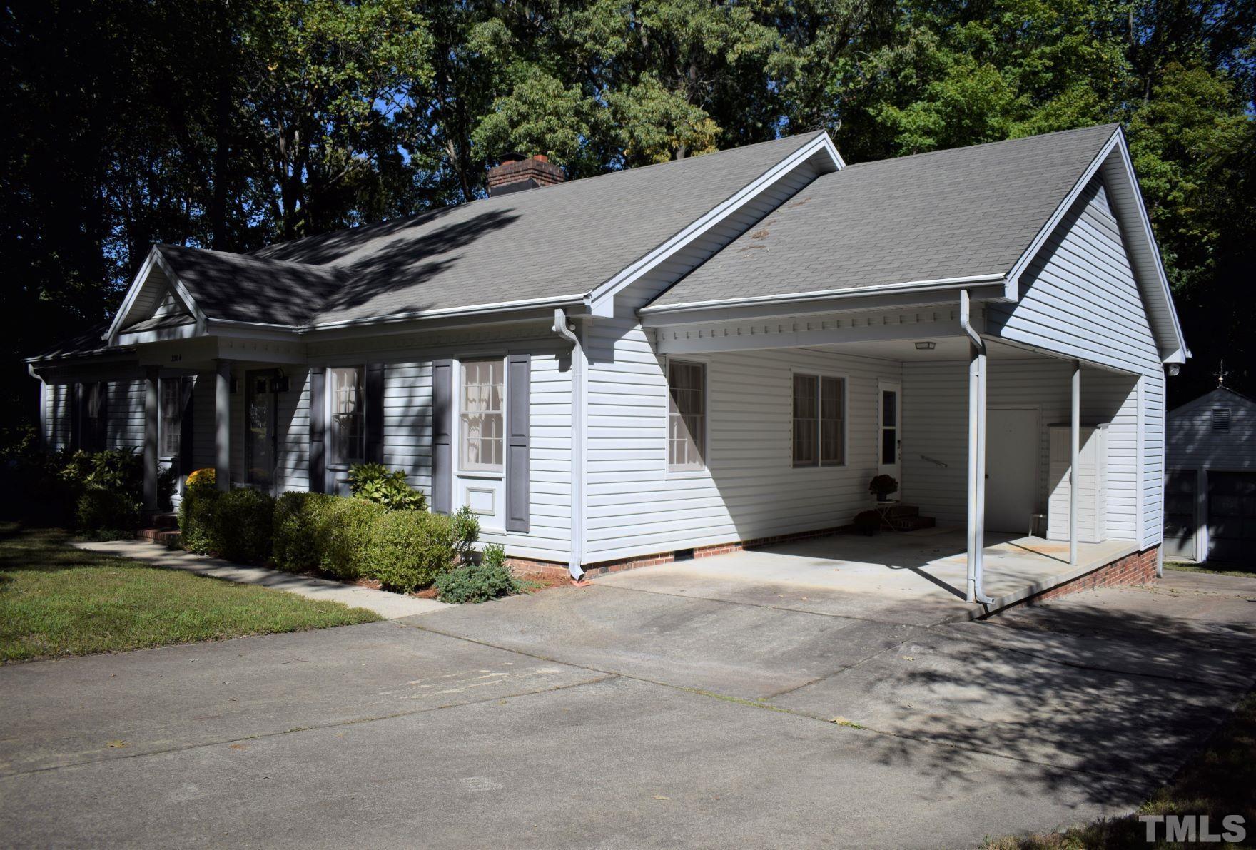 2204 Rangecrest Road Raleigh, NC 27612 - Photo 2 of 28 Carport, parking pad, Garage/workshop in rear