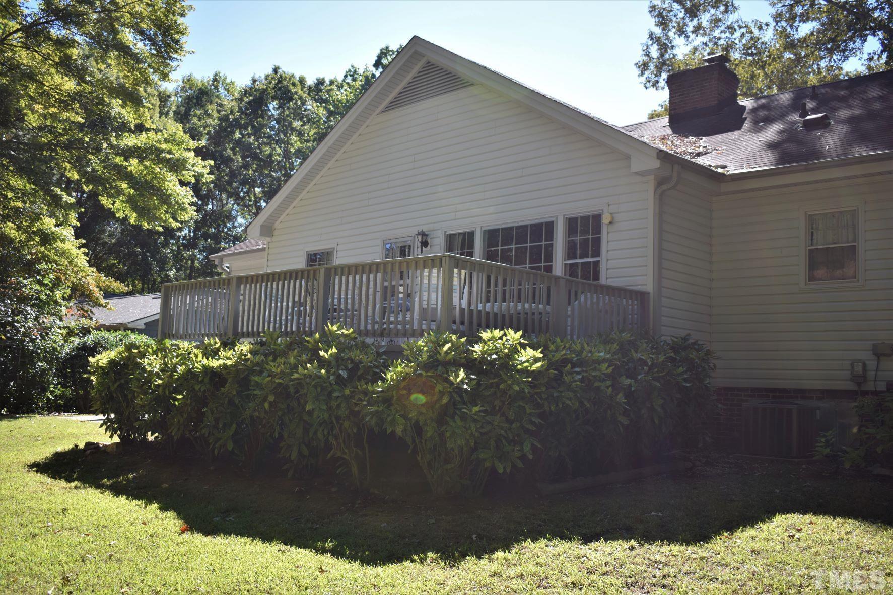 2204 Rangecrest Road Raleigh, NC 27612 - Photo 27 of 28 Spacious deck to enjoy lovely back yard