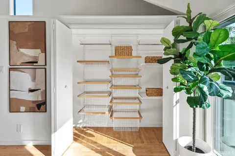a view of entryway with wooden floor