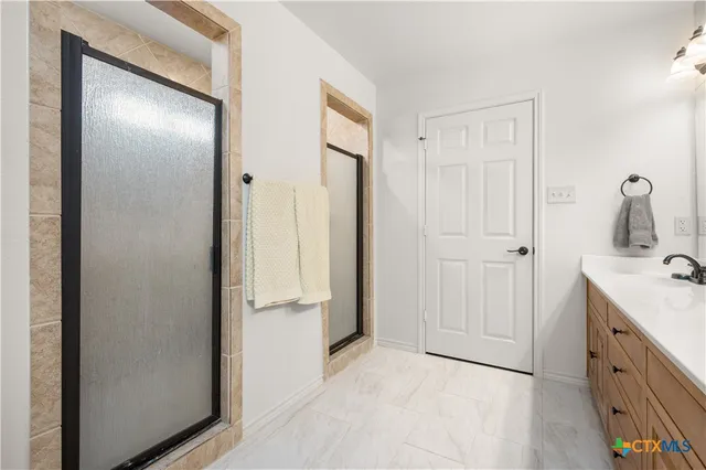 a view of a lake with a yard