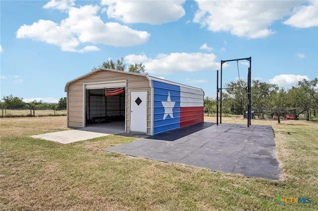 a view of a room with rack on the wall