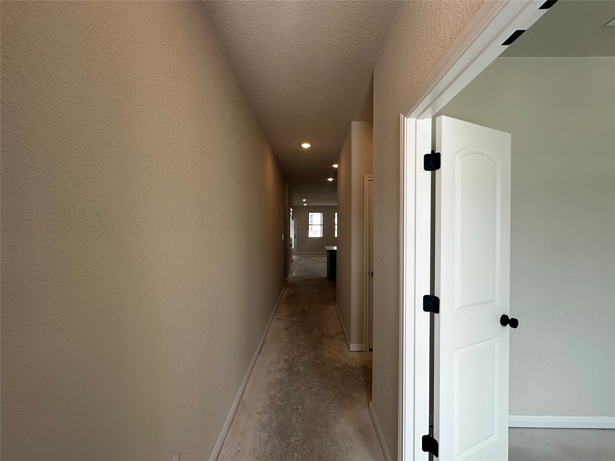 1053 Sienna Bear Road Georgetown, TX 78633 - Photo 4 of 32 a view of a hallway with wooden floor