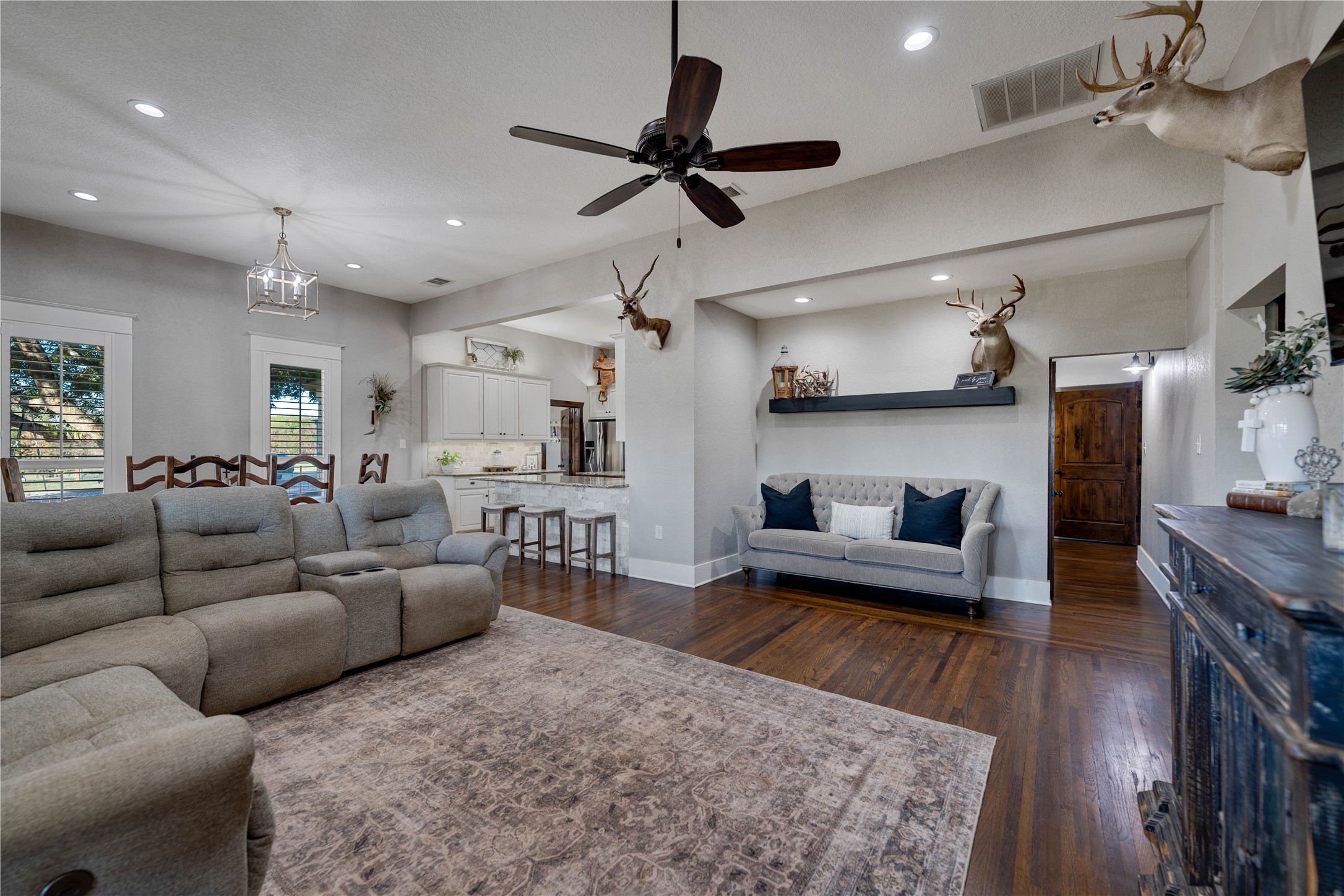 8323 East State Highway 29 Georgetown, TX 78626 - Photo 15 of 39 a living room with furniture and a wooden floor