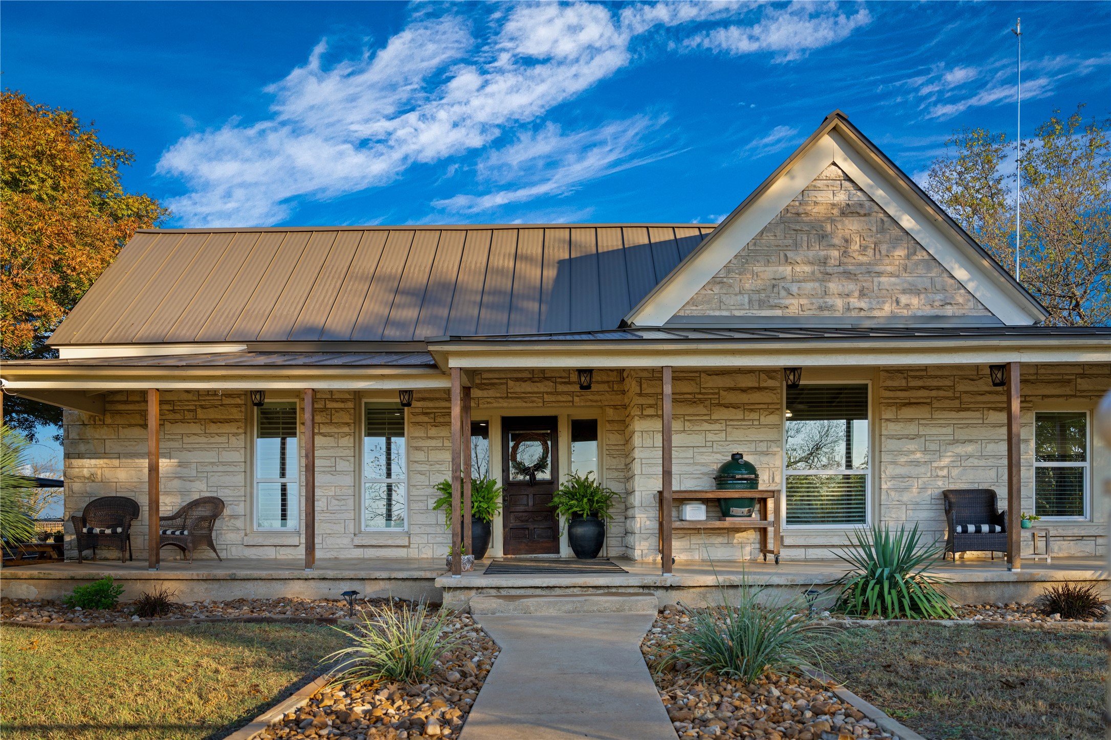 8323 East State Highway 29 Georgetown, TX 78626 - Photo 2 of 39 a front view of a house with garden