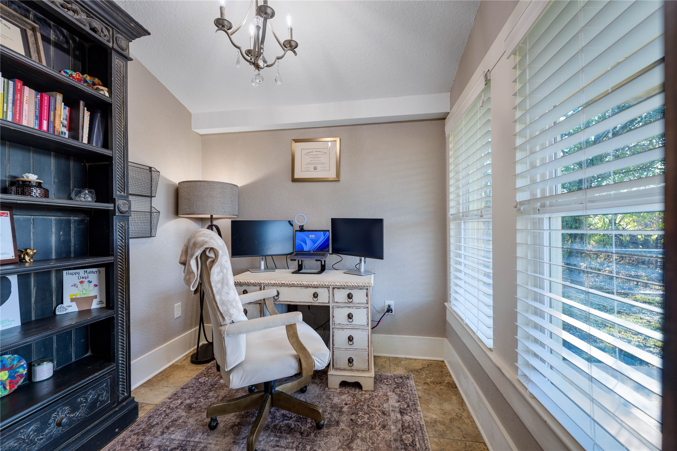8323 East State Highway 29 Georgetown, TX 78626 - Photo 23 of 39 a workspace with furniture bookshelf and a window