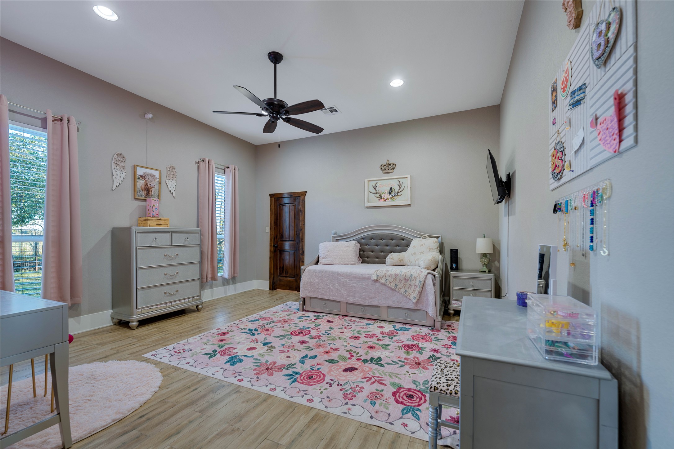 8323 East State Highway 29 Georgetown, TX 78626 - Photo 27 of 39 a bedroom with furniture and a dresser