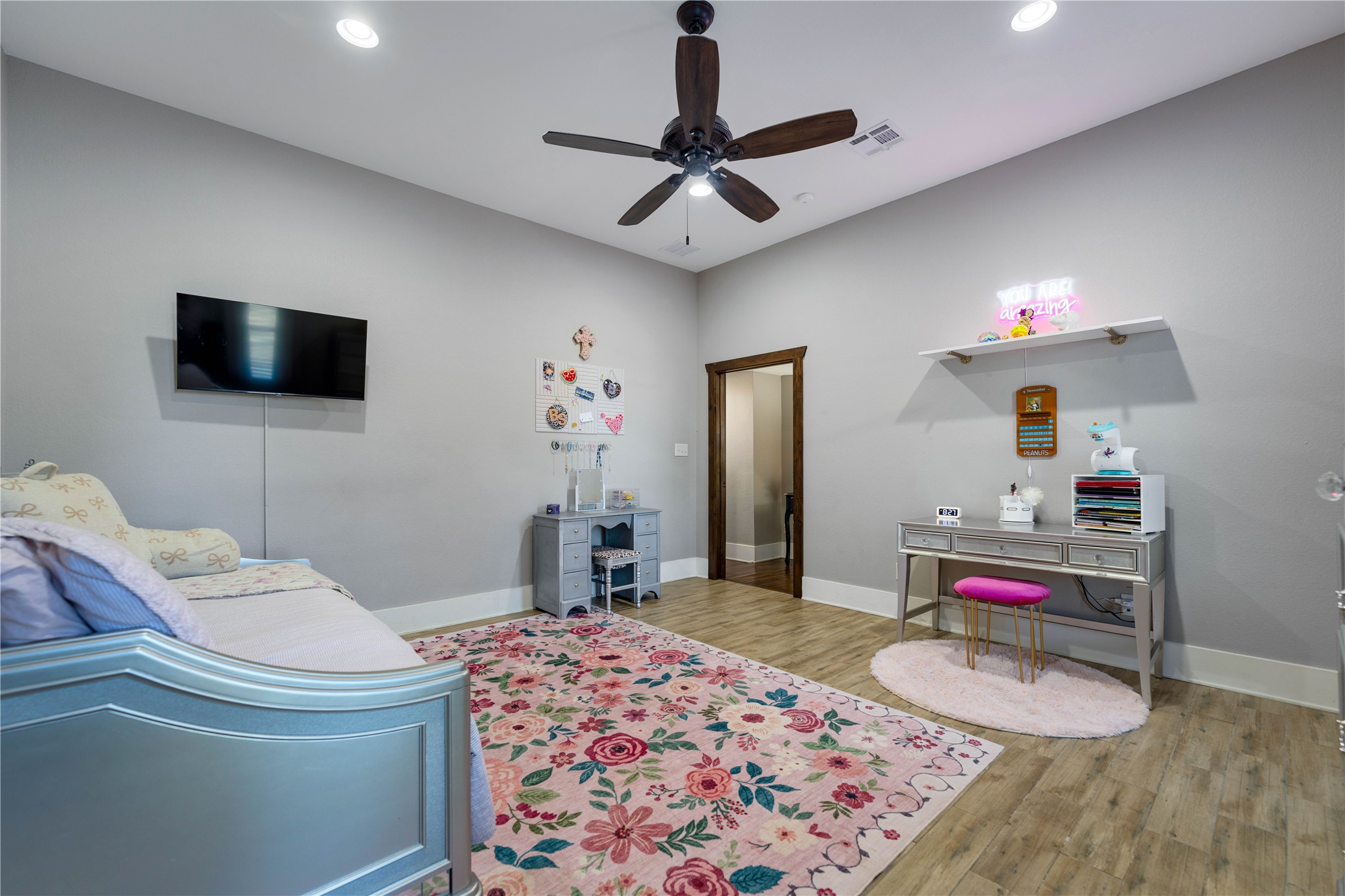 8323 East State Highway 29 Georgetown, TX 78626 - Photo 28 of 39 a bedroom with a bed and a flat screen tv